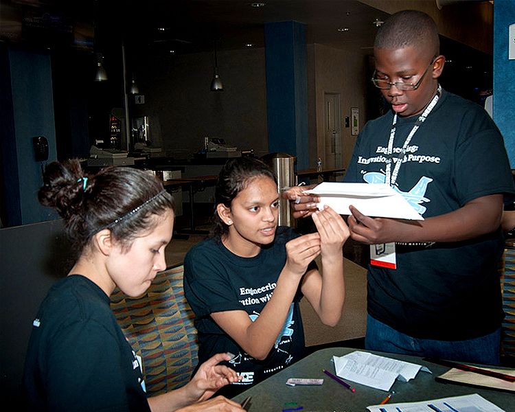 Students building stunt planes at TAME's 2014 State Math and Science Competition at Lockheed Martin Aeronautics.